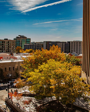 Downtown Idaho aerial view with fall foliage and blue sky