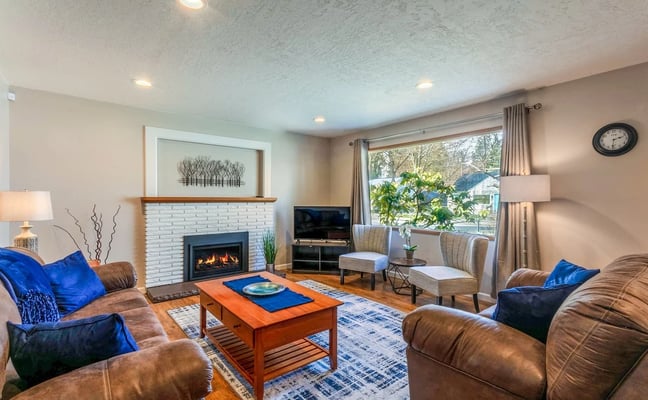 Living room with gas fireplace and hardwood floors at 1022 Montana in Coeur d'Alene